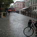 Girl on bike, raining